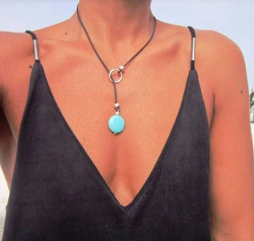 Collana bohemien con ciondolo turchese